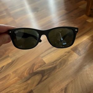 Ray Bans black matte sunglasses.